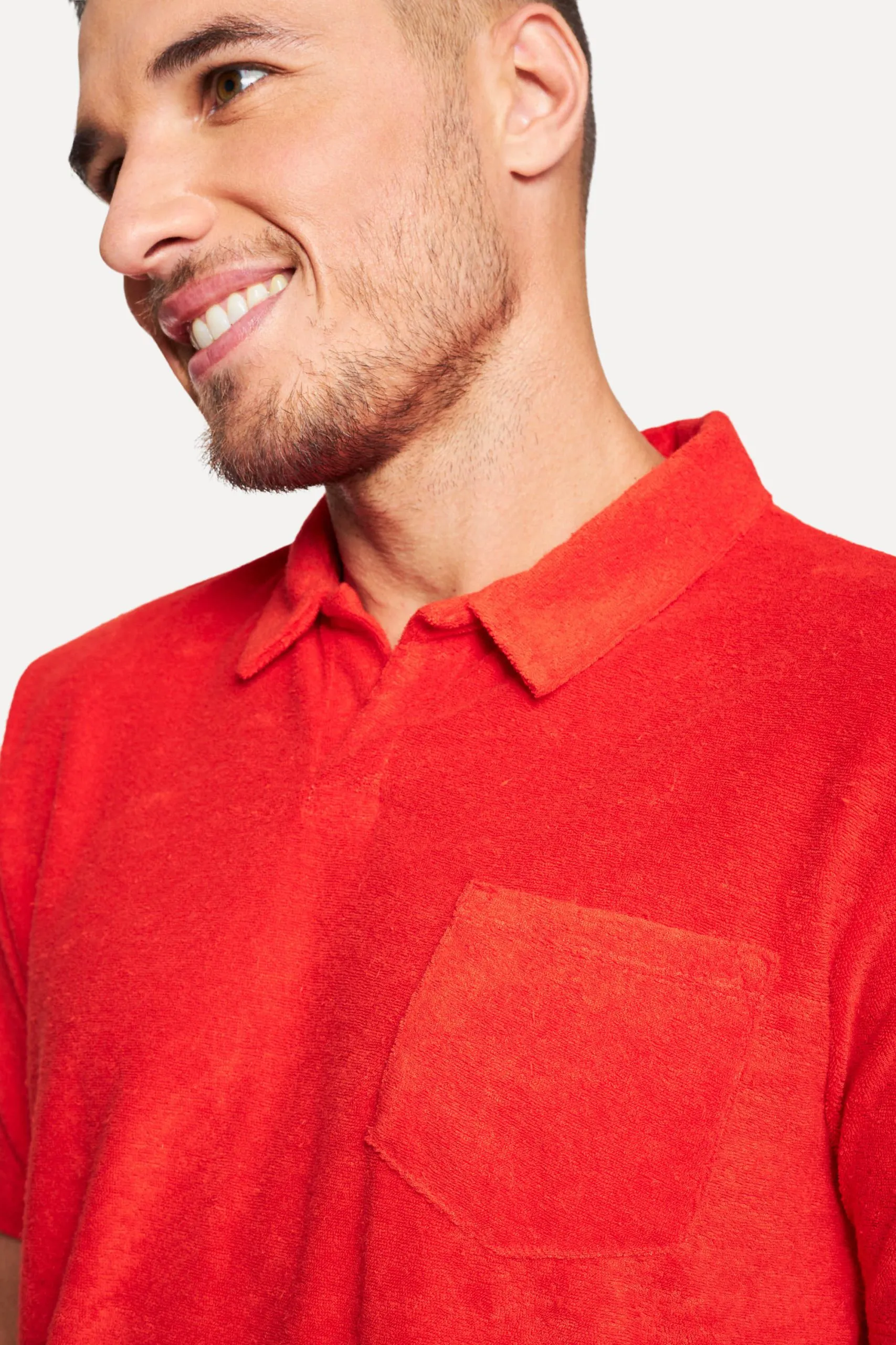 POLO MC ATOALHADA LISA COM BOLSO